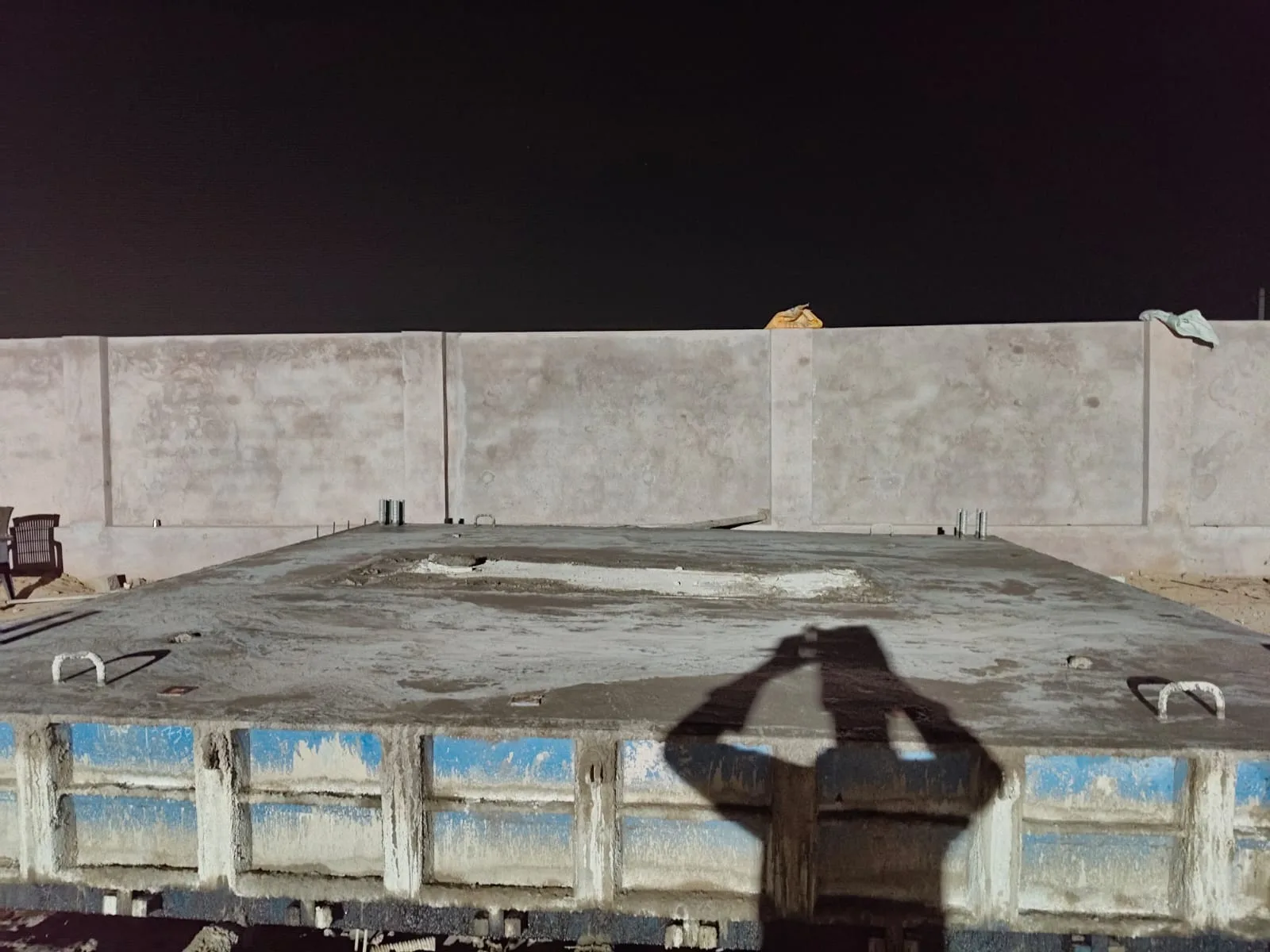 Night-shift precast panel placement — Fortico Infra solar project site