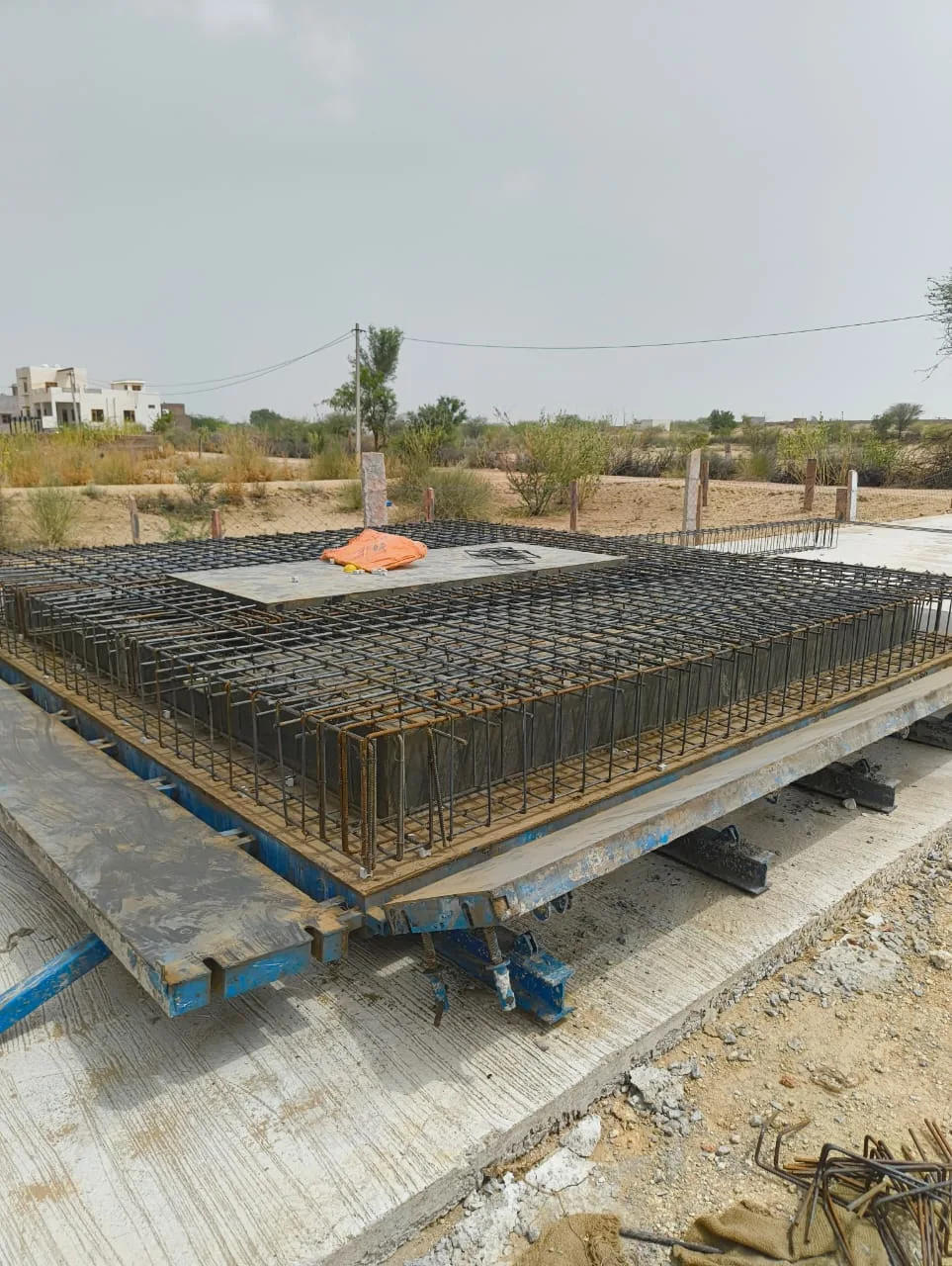 Raft foundation rebar cage with crane access — Fortico Infra solar project site
