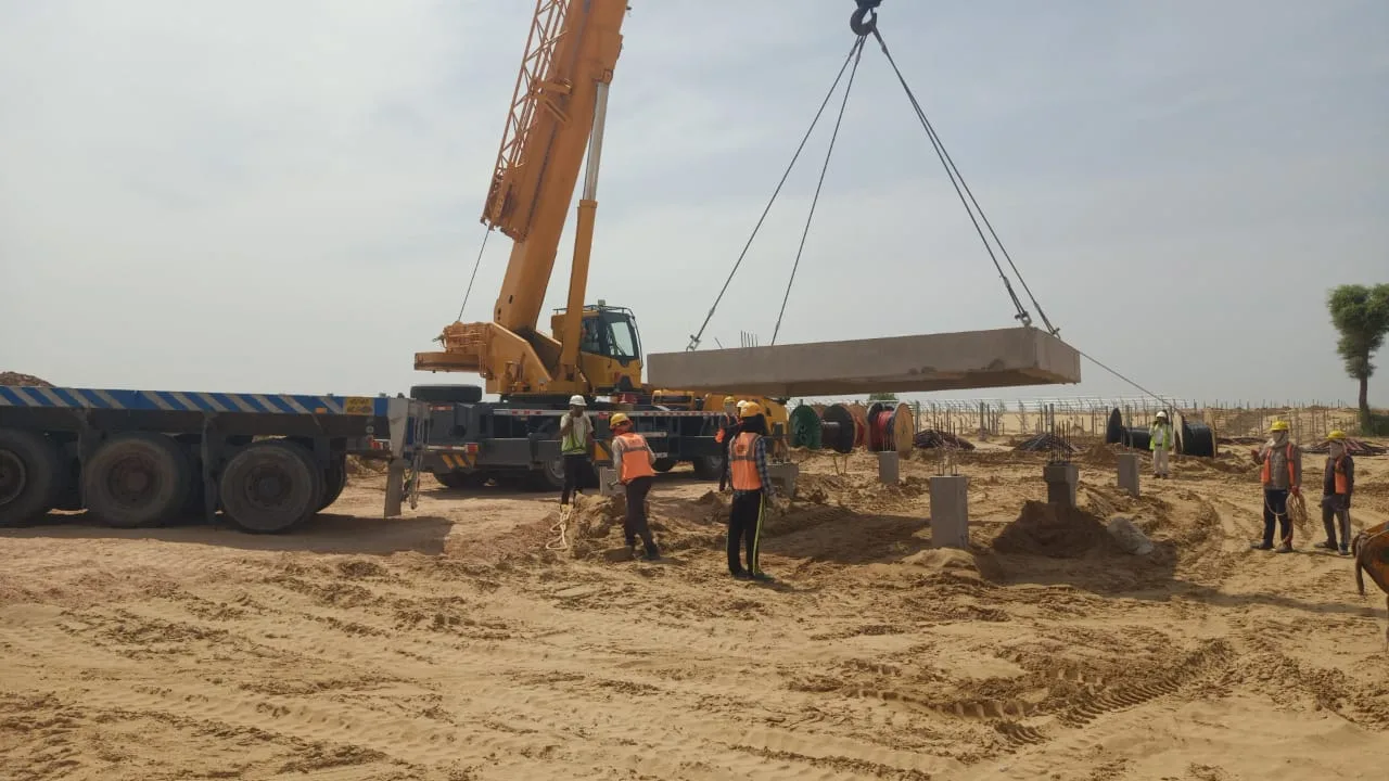 Precast beam loaded onto trailer for site delivery — Fortico Infra solar project site